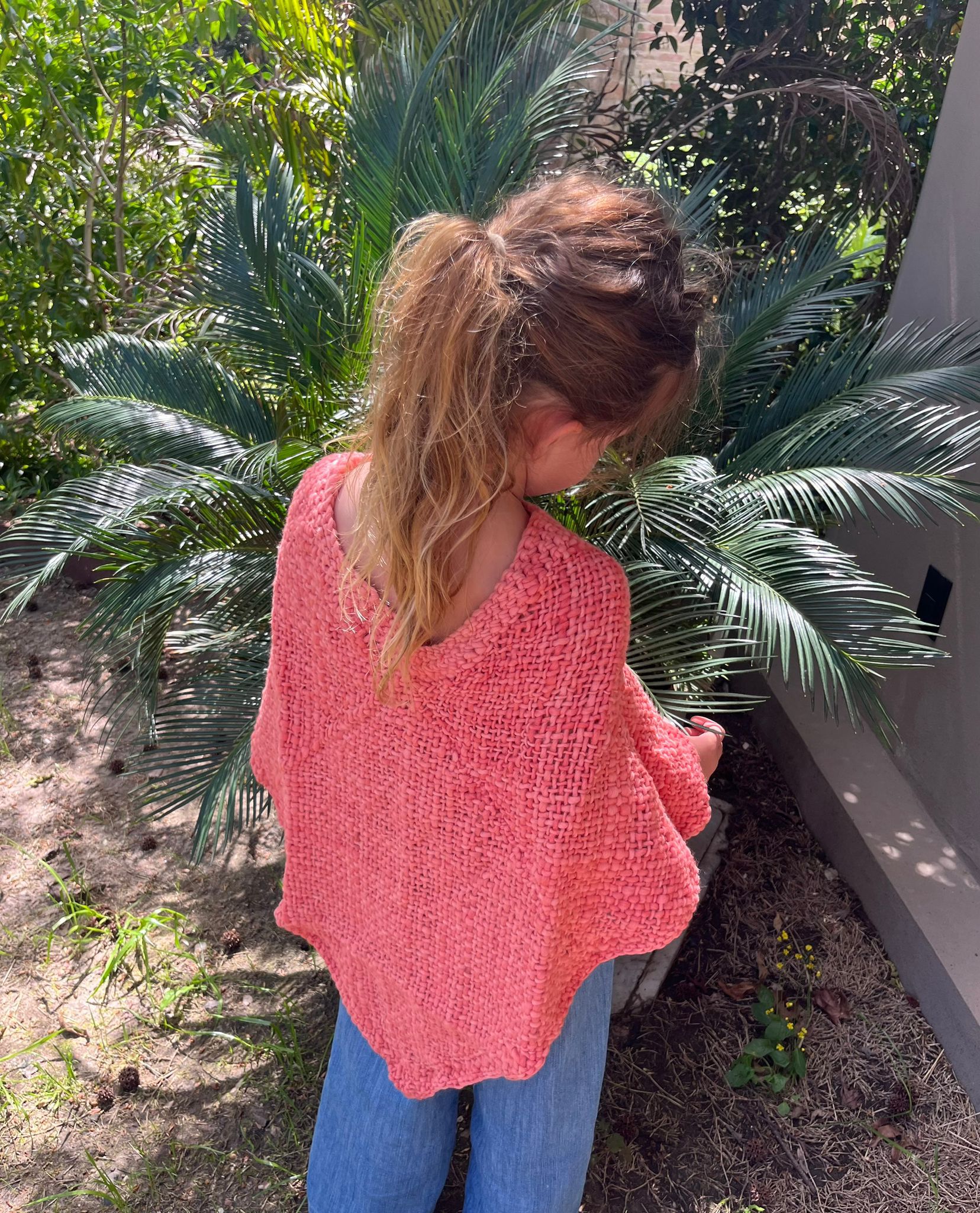 Poncho toda estacion color fresa - Talle S (2 años a 3 años).